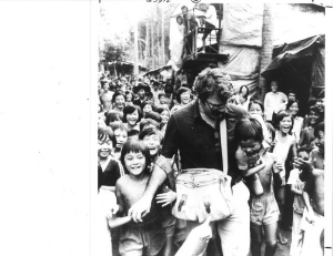 George Miller - US Democrats Congressman - in Malaysia greeting children at a Vietnamese refugee camp. 